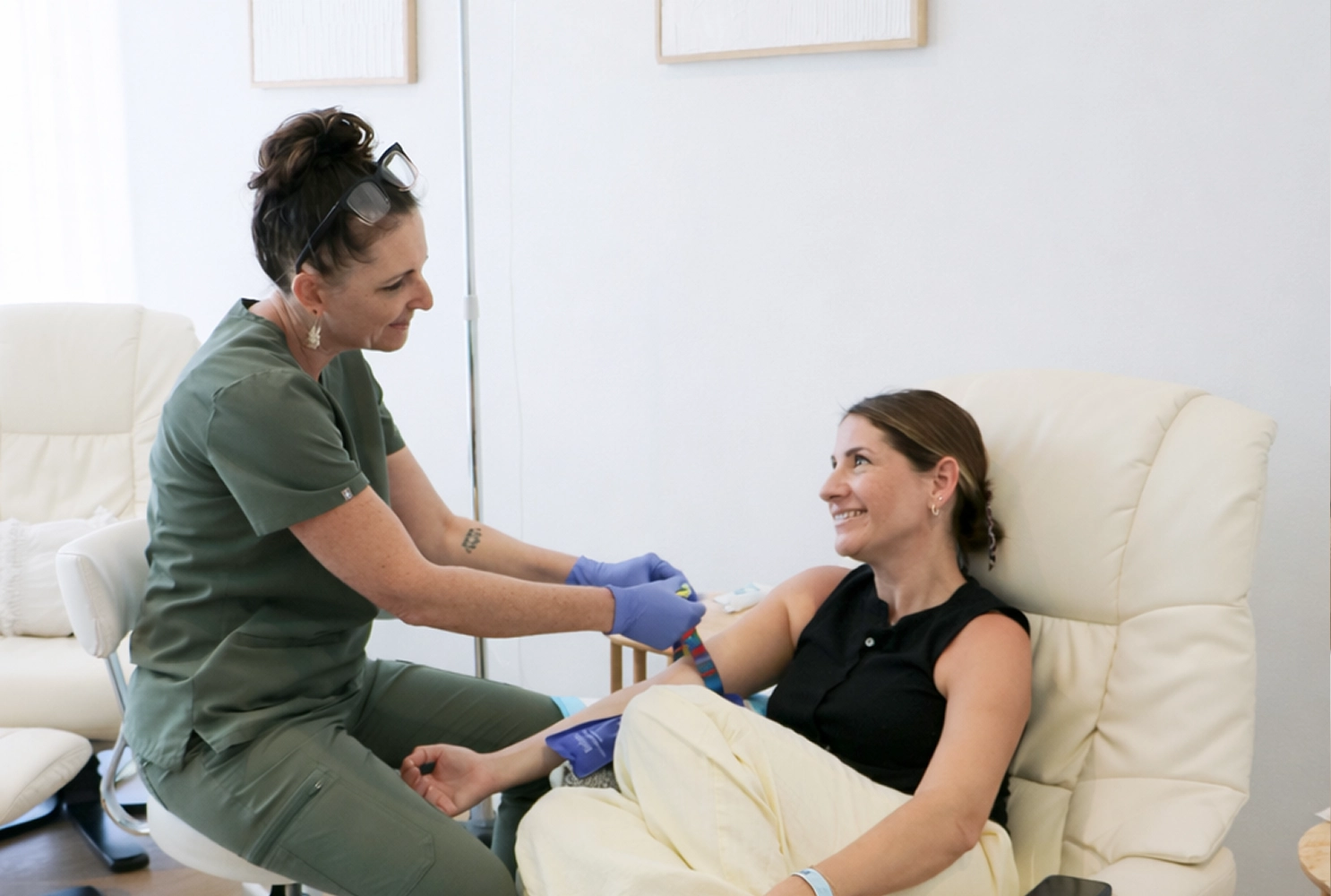 Blood test results review as part of IV therapy assessment